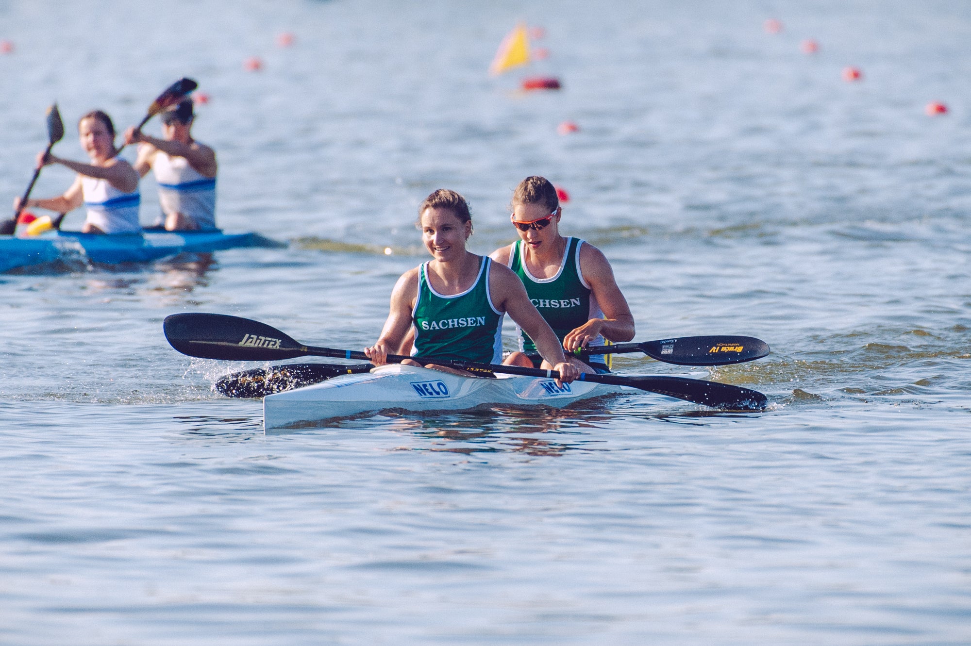 Female athletes in a K2 stoked after a race in Brandenburg.