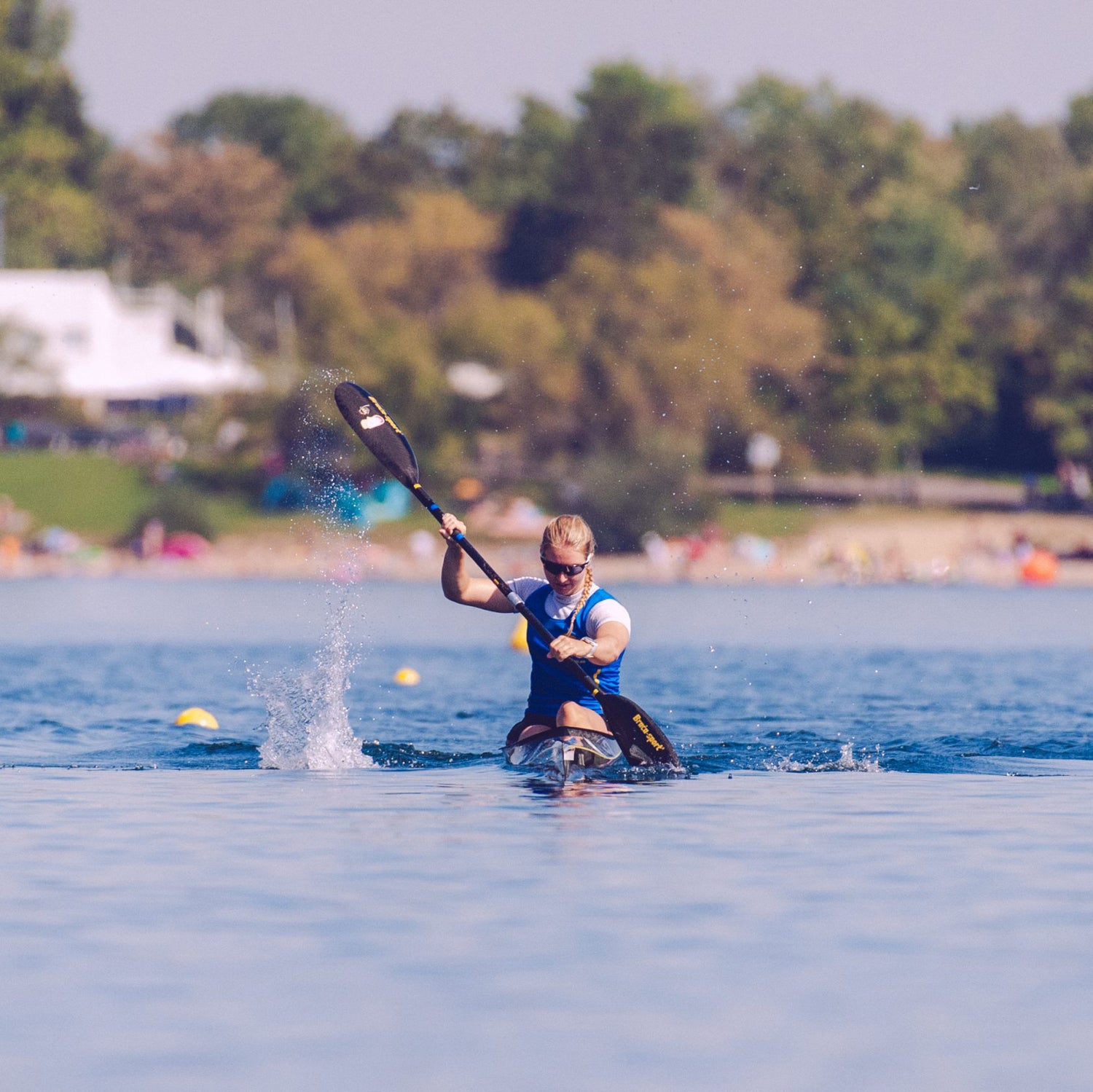Woman in a black Nelo Vanquish at the start of a race.